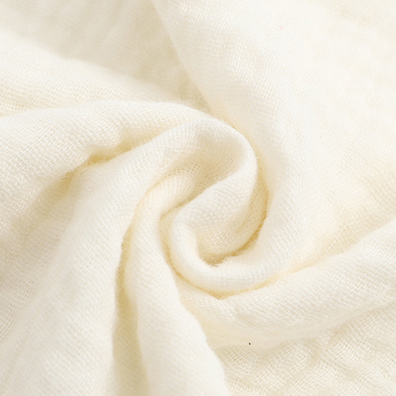 Barboteuse en gaze de coton avec bouton-pression en bas